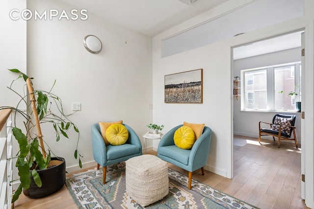 65 Jackson St, New York City, NY 11211 - sitting room featuring wood finished floors and baseboards