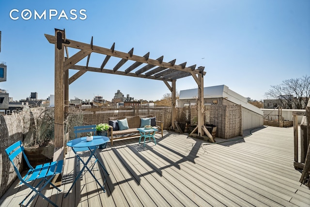 65 Jackson St, New York City, NY 11211 - wooden deck featuring a pergola