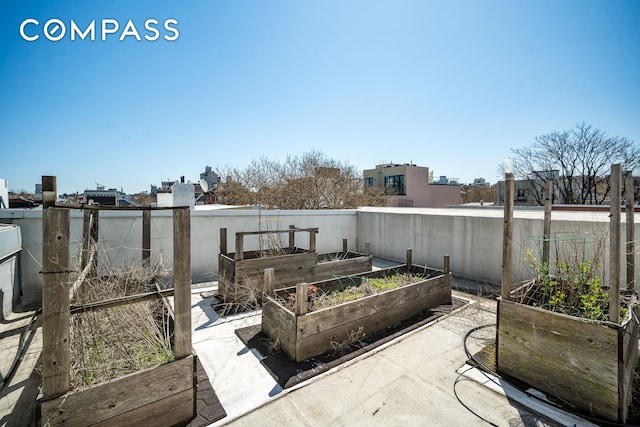 65 Jackson St, New York City, NY 11211 - view of patio / terrace with a vegetable garden