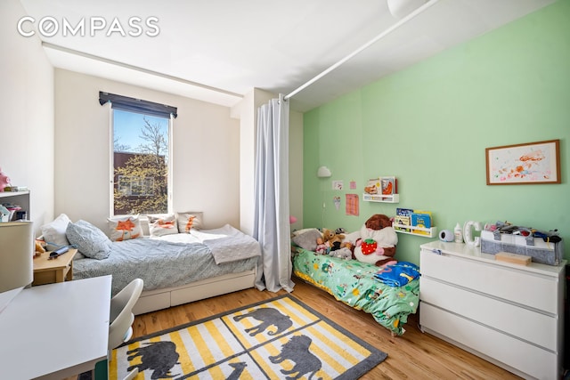 65 Jackson St, New York City, NY 11211 - bedroom with light wood-style floors