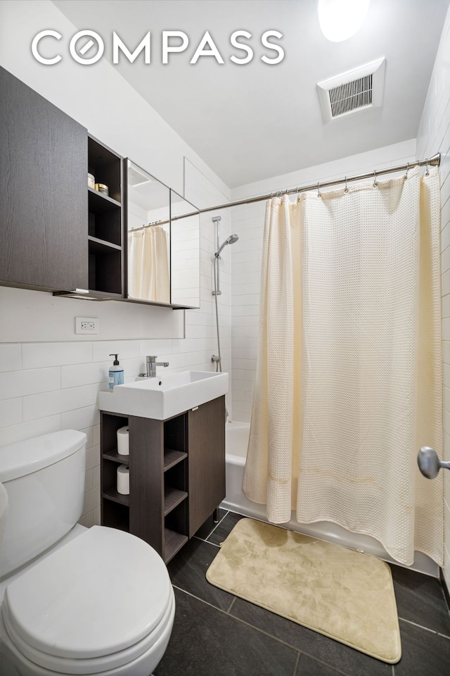 65 Jackson St, New York City, NY 11211 - bathroom featuring shower / bath combo, vanity, and tile patterned flooring