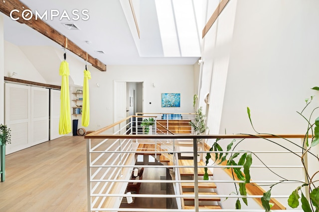 65 Jackson St, New York City, NY 11211 - stairway with wood finished floors