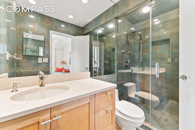 112 E 83rd St Unit 6C, New York City, NY 10028 - full bathroom with vanity, a shower stall, and recessed lighting