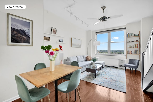96 Schermerhorn St Phc, Phc, New York City, NY 11201 - living room with rail lighting, ceiling fan, wood-type flooring, and stairs