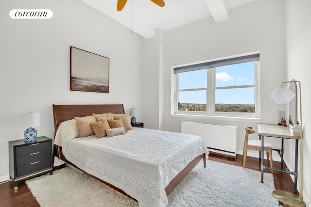96 Schermerhorn St Phc, Phc, New York City, NY 11201 - bedroom with radiator, dark wood-type flooring, beamed ceiling, ceiling fan, and baseboards