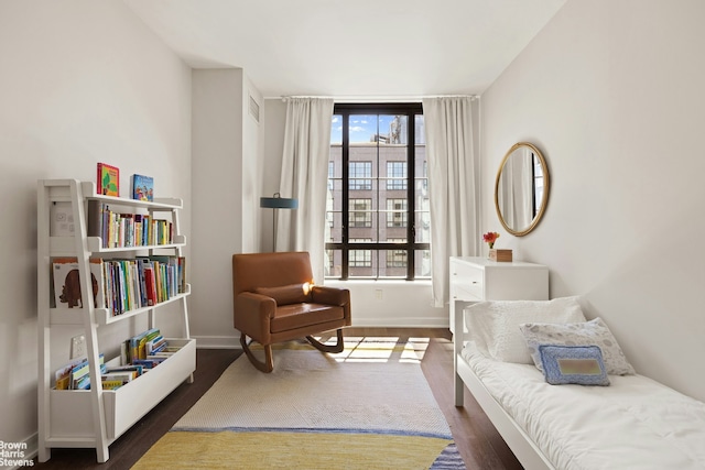 205 Water St Unit 6K, New York City, NY 11201 - bedroom featuring dark wood-style flooring and baseboards