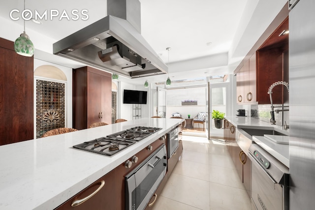 11 Vestry St Ph, Ph, New York City, NY 10013 - kitchen with island exhaust hood, dishwashing machine, stainless steel gas cooktop, a sink, and light tile patterned floors
