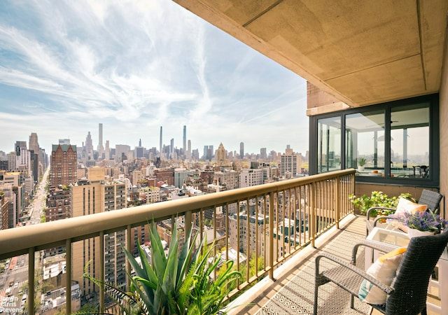 balcony featuring a view of city