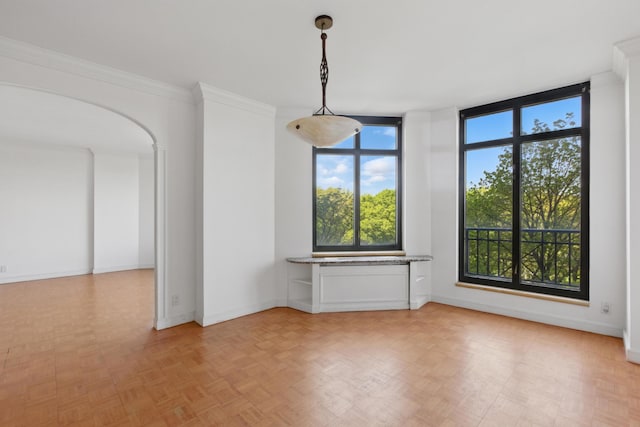 222 Riverside Dr Unit 5A, New York City, NY 10025 - unfurnished dining area featuring arched walkways and baseboards