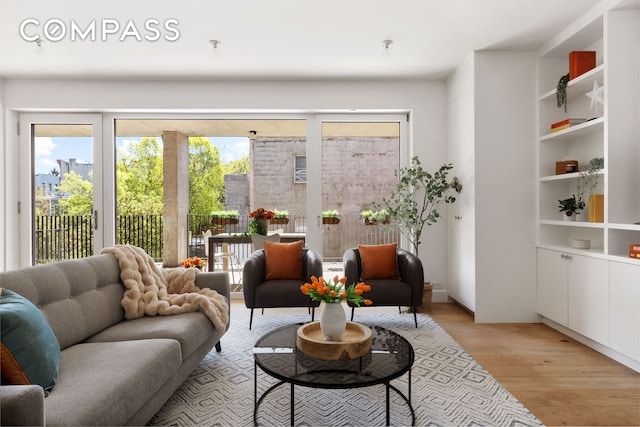 living area with light wood-style flooring