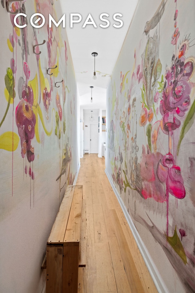 hallway featuring light wood-style flooring