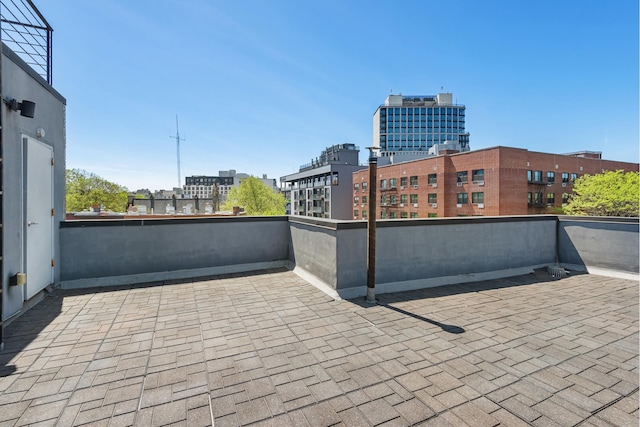 view of patio with a balcony