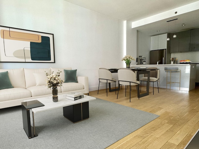 2-26 50th Ave Unit 7-F, New York City, NY 11101 - living area featuring light wood-style flooring and baseboards