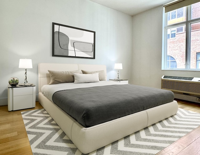 2-26 50th Ave Unit 7-F, New York City, NY 11101 - bedroom featuring light wood-style flooring