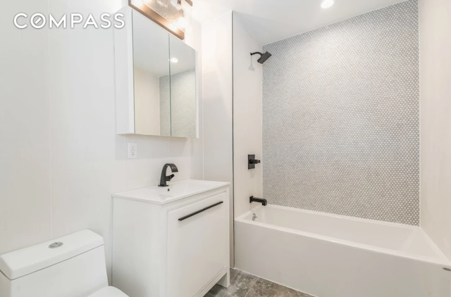 full bath featuring toilet, shower / tub combination, and vanity