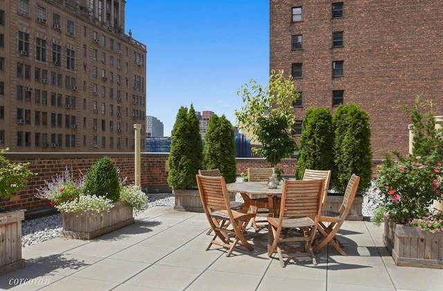 view of patio featuring outdoor dining space