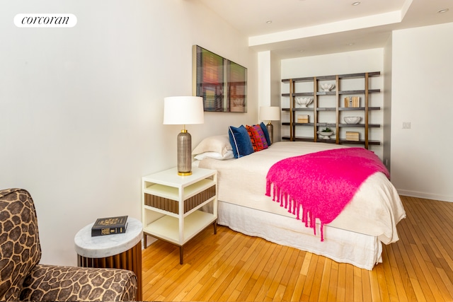 bedroom featuring hardwood / wood-style flooring