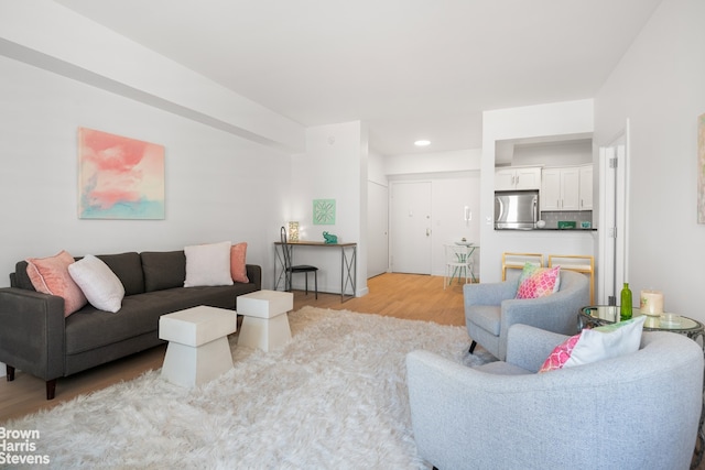 520 E 72nd St Pha, Pha, New York City, NY 10021 - living room with light wood-style floors and recessed lighting