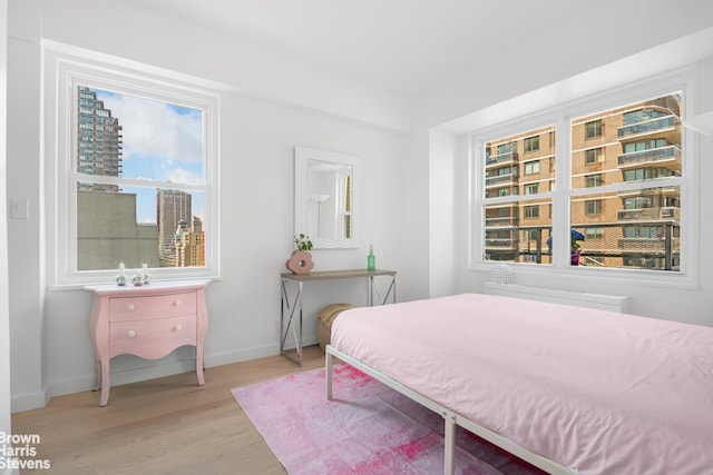 520 E 72nd St Pha, Pha, New York City, NY 10021 - bedroom featuring light wood finished floors and baseboards