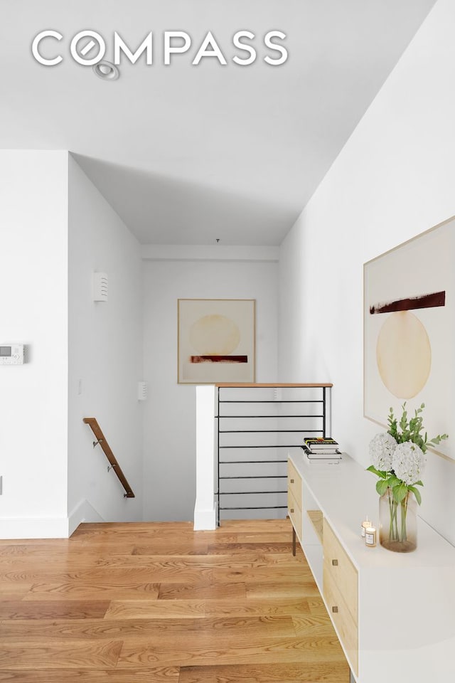 79 Clay St Unit 1R, New York City, NY 11222 - hall featuring an upstairs landing and light wood finished floors