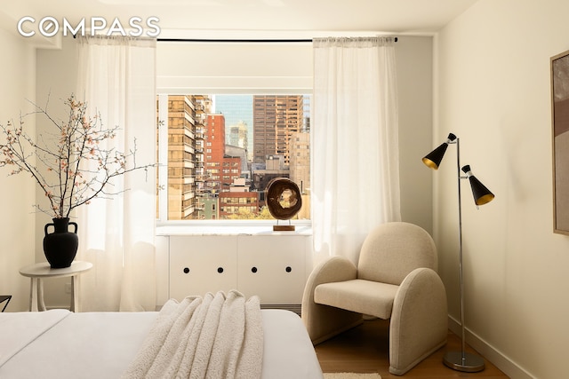 166 E 63rd St Unit 11Bc, New York City, NY 10065 - bedroom featuring baseboards