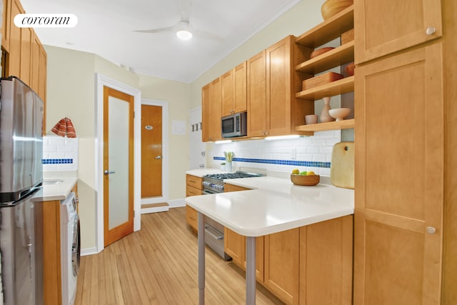 330 W 17th St Unit 2E, New York City, NY 10011 - kitchen with appliances with stainless steel finishes, open shelves, backsplash, light countertops, and light wood-style flooring