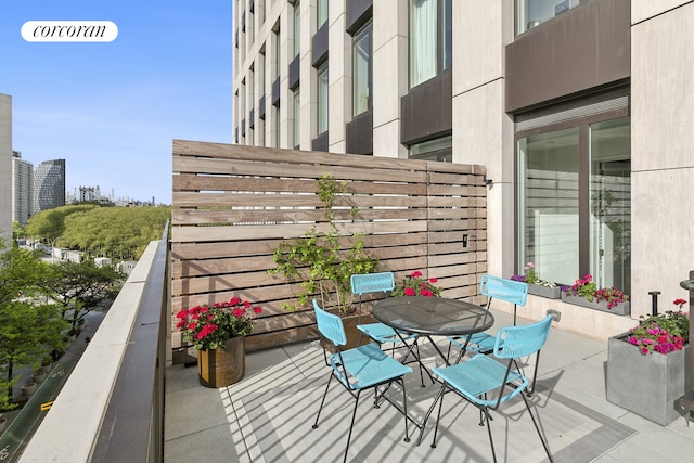 balcony with outdoor dining space