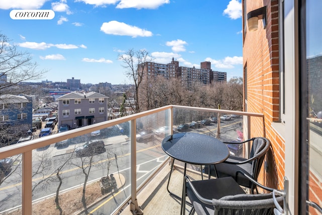 balcony featuring a view of city