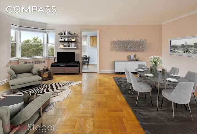 living area featuring baseboards, ornamental molding, and radiator heating unit