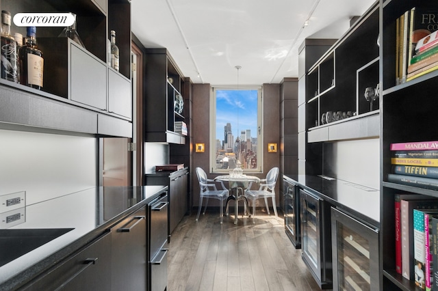 interior space featuring beverage cooler and a city view