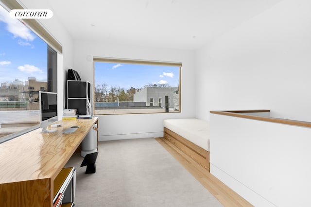 home office with visible vents and light wood-style floors