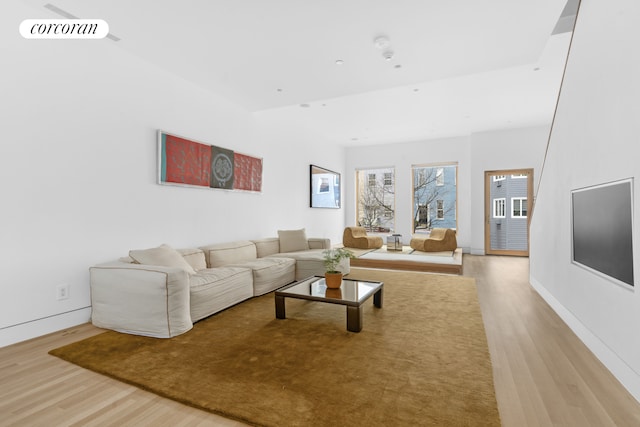 living room with wood finished floors