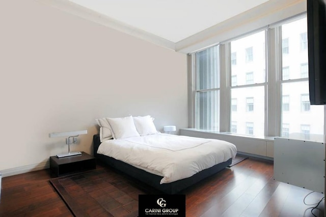 55 Wall St Unit 632, New York City, NY 10005 - bedroom featuring wood finished floors