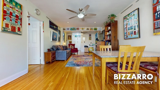 dining space with light wood-type flooring, recessed lighting, baseboards, and ceiling fan