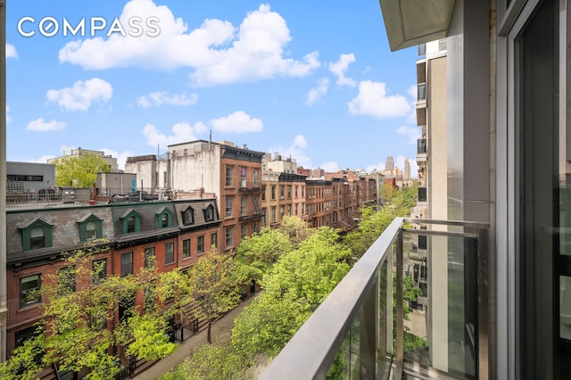 balcony featuring a view of city