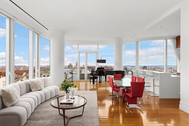 sunroom featuring a view of city
