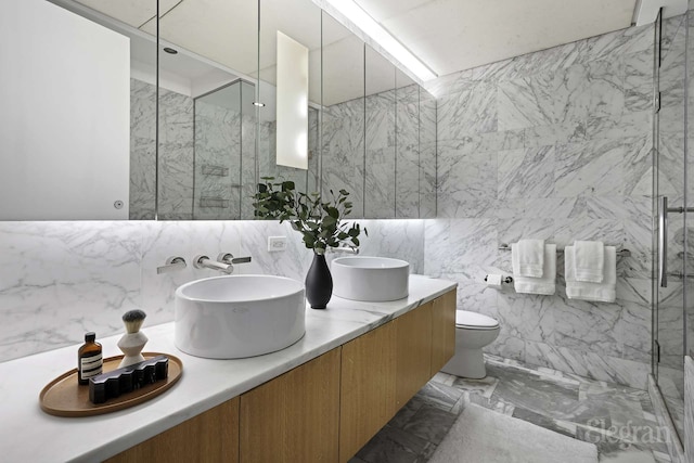 18 W 48th St Phd, Phd, New York City, NY 10036 - full bath with backsplash, a sink, tile walls, and a marble finish shower