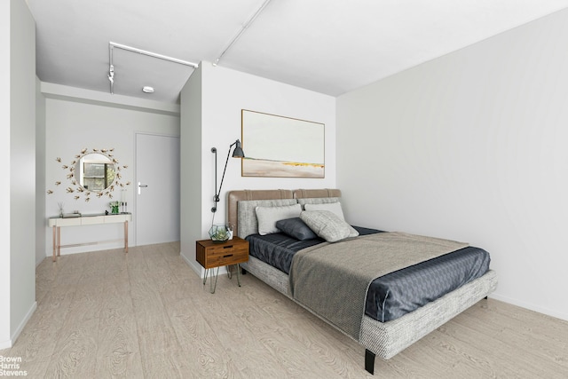 430 E 56th St Unit 4G, New York City, NY 10022 - bedroom with light wood-type flooring