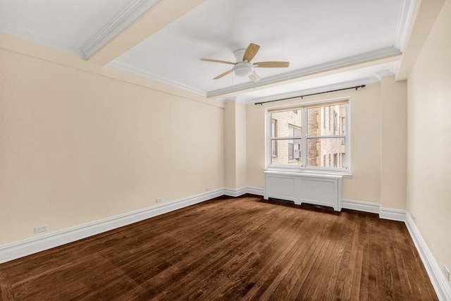 unfurnished room featuring crown molding, a ceiling fan, dark wood finished floors, and baseboards
