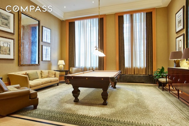 game room with plenty of natural light, ornamental molding, and pool table