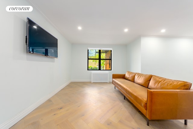 living area featuring crown molding, radiator, baseboards, and recessed lighting