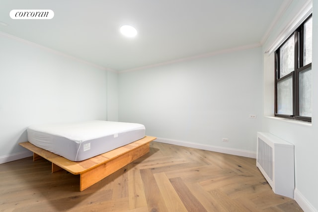 bedroom with crown molding, baseboards, and visible vents