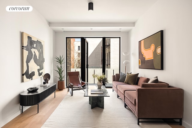 630 Grand Ave Unit 407, New York City, NY 11238 - living area featuring wood finished floors and baseboards