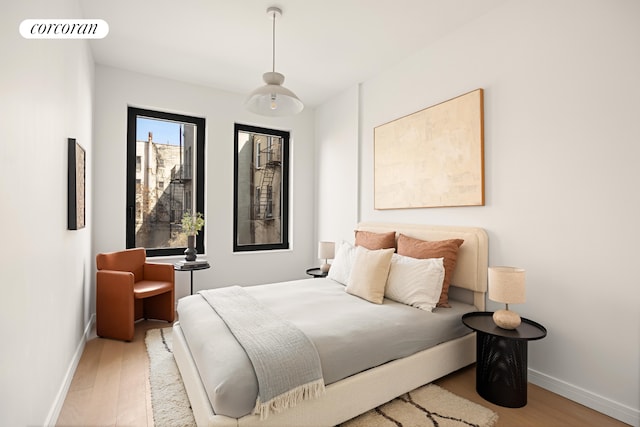 630 Grand Ave Unit 407, New York City, NY 11238 - bedroom with wood finished floors and baseboards