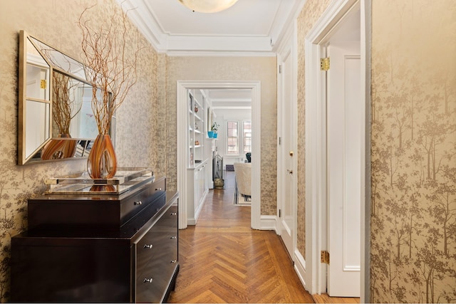 corridor featuring wallpapered walls and crown molding