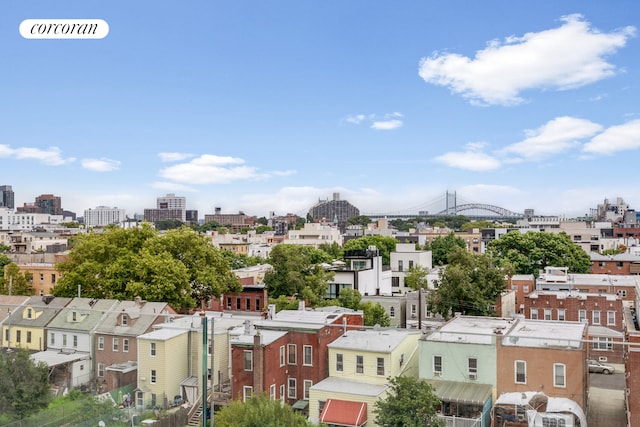 birds eye view of property with a view of city