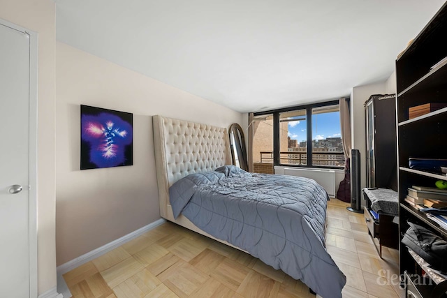 bedroom with baseboards
