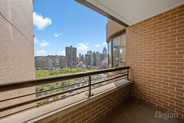 balcony featuring a view of city