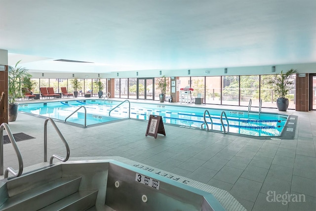 pool with a patio area