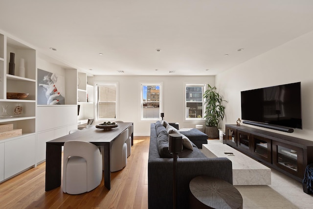 141 W 126th St Unit 4A, New York City, NY 10027 - living area with light wood finished floors and recessed lighting